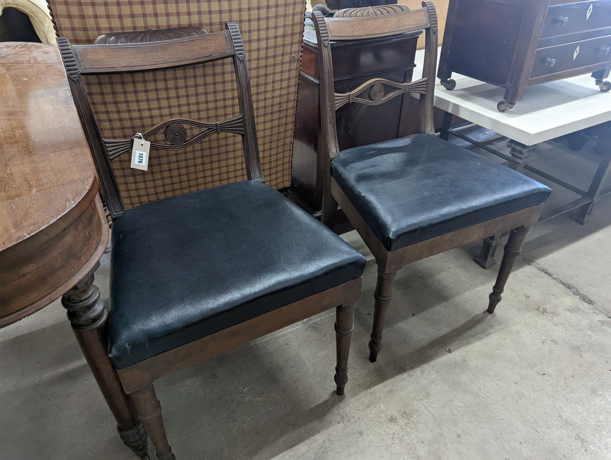 A pair of Regency mahogany dining chairs